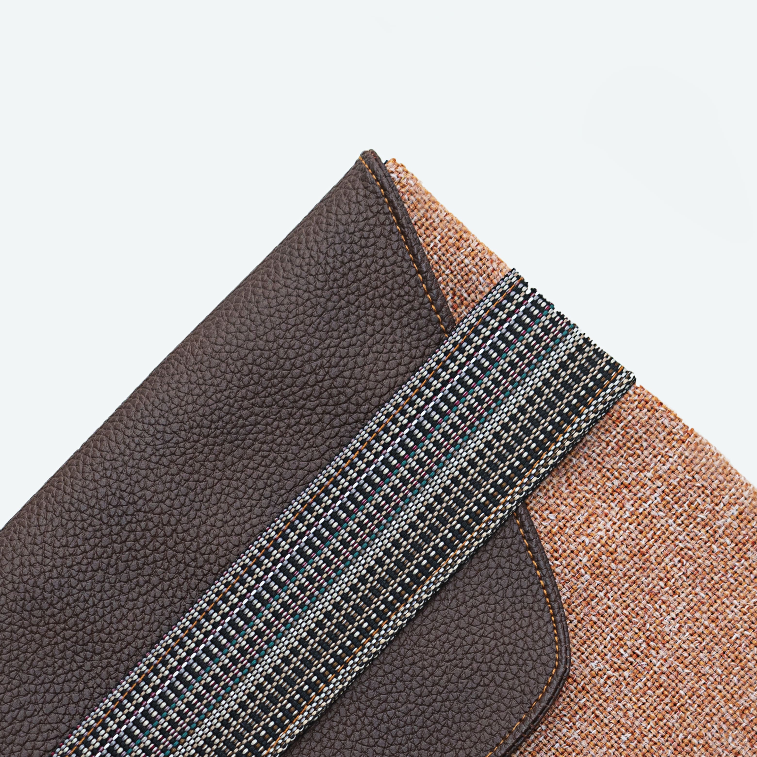 Pouch in shades of brown, leather and fabric